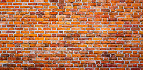 Panoramic Bright Orange Red Brick Wall Background