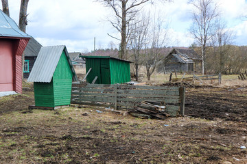 old wooden house in the small village in russian outback