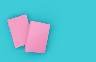 Two pink hardcover books template mock-up on blue cyan background flat lay top view from above, modern minimal concept with copy space