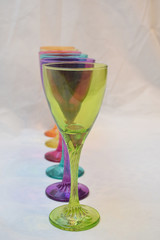 Mock up design set of elegant and traditional drink ware / drinking glass & Jar for wine or juice, colorful transparent isolated on black background 