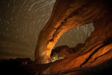 Star trails behind North Window Arch, Arches National Park, Utah © Arthur Cauty