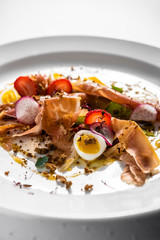 Prosciutto bacon meat salad with, strawberries