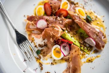 Prosciutto bacon meat salad with, strawberries