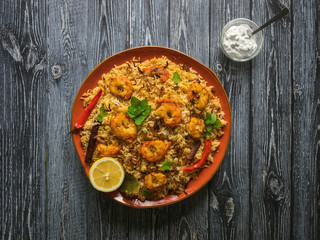 Indian Biryani with shrimp. Tasty and delicious prawns biryani, top view