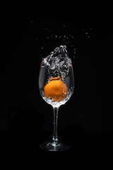 Fruits splashing in to the water
