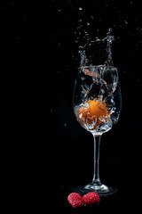 Fruits splashing in to the water