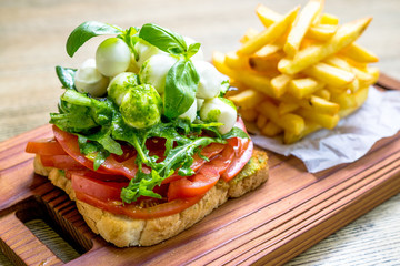 Mozzarella cheese sandwich toast and green lettuce