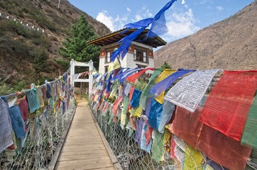 Metal bridge with prayer flags in Bhutan