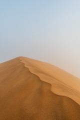 Fototapeta na wymiar Dune 78 sunrise with fog