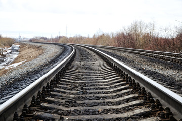 Fototapeta premium railway wooden sleepers. fastening the rails to the sleepers with bolts.