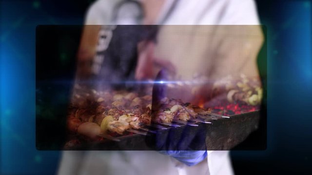 Doctor, in blue medical gloves, presents hologram image of grilled barbecue. Doctor makes freeze frame, puts stamp closed. Prohibitions during coronavirus epidemic, quarantine.