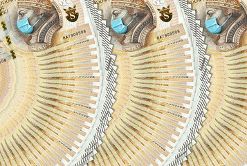 Coronavirus in Poland. Quarantine and global recession. 200 Polish zloty banknote with face mask...