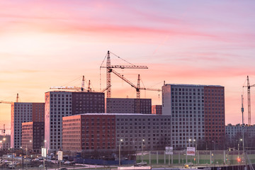 Fototapeta premium Construction of houses. Construction of new houses in Moscow. Residential complex Buninskie Luga .