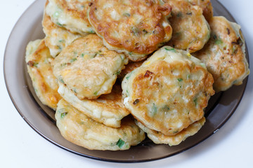 Fried pastry with egg and green onion