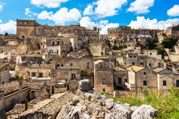 Old town panoramic sunny summer view of Matera, Province of Matera, Basilicata Region, Italy