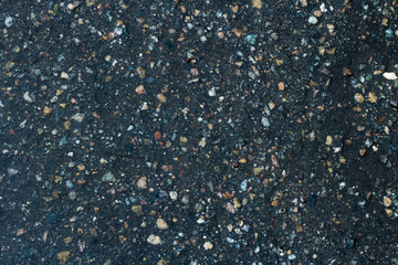 Pebbles in Asphalt Black High Contrast Texture Background