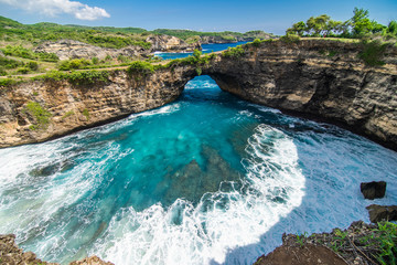 Panoramic view of broken beach in Nusa Penida, Bali, Indonesia. Blue Sky, Turquoise Water.