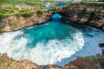 Panoramic view of broken beach in Nusa Penida, Bali, Indonesia. Blue Sky, Turquoise Water.