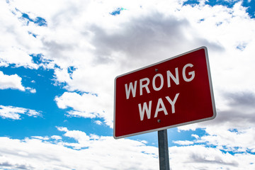 red road sign wrong way