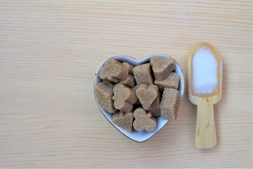 coffee beans on wooden spoon