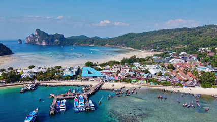 Fototapeta premium Aerial view of Phi Phi Island Port and Tonsai Pier, Thailand