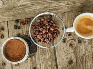 Cup and grain of coffee