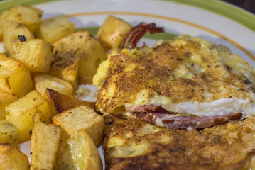 exquisite omelette with bacon and Argentine fries