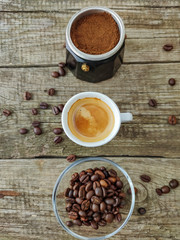 Cup and grain of coffee