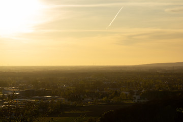 sunset over a a town in germany