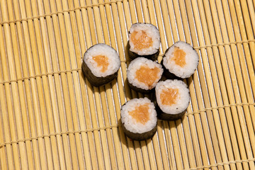 maki rolls Asian cuisine rustic food photography poster background concept with rice and salmon