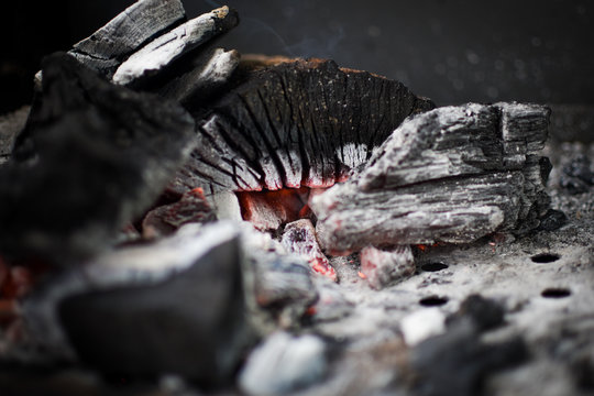 Frewood, charcoal and fire prepared for a good barbecue.