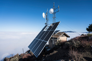 Solar communication towers on top of Josephine Peak in the San Gabriel Mountains and Angeles...
