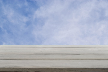 Abstract cloudy sky and weathered grey wood background