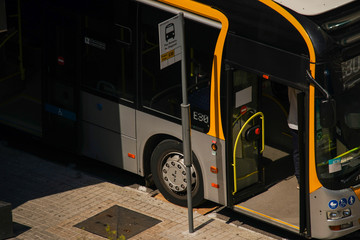 Bus driver during the coronavirus pandemia not wearing hazmat suits. Barcelona,Spain. March 2020