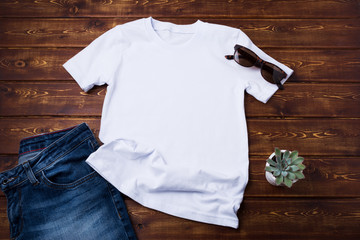 Unisex T-shirt mockup with jeans and succulent