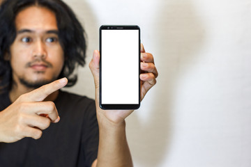 Asian men showing mobile phones