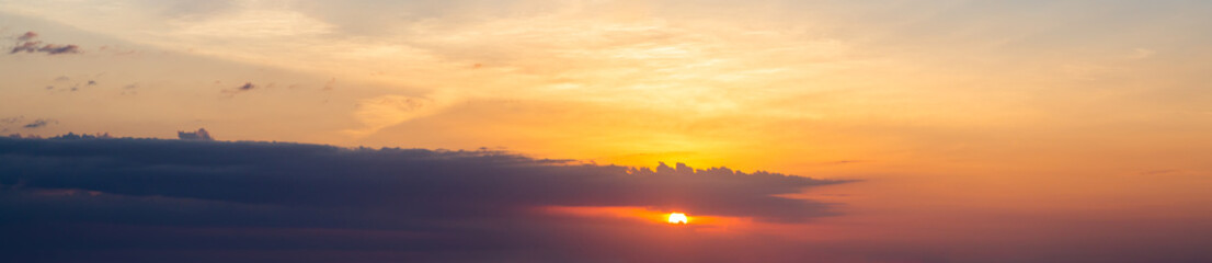Dramatic Panoramic View of a cloudscape during a cloudy and colorful sunset. Taken over Varadero, Cuba.