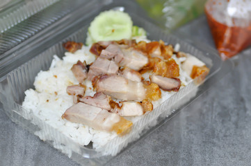 crispy pork with rice, rice topped with crispy pork