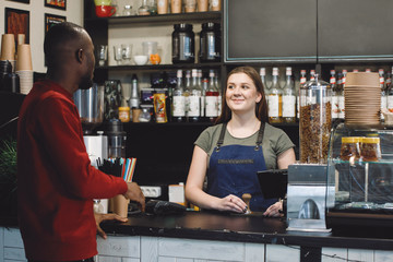 Obraz premium African man in a cafe.