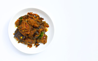 Thai spicy food, Stir fried catfish on dish on white background.