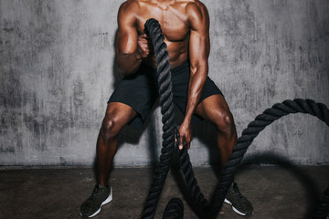 Fit man in studio gym