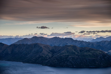 New Zealand landscape background. Roys peak mountain hike in Wanaka New Zealand. Popular tourism travel destination. Hiking travel and adventure. 