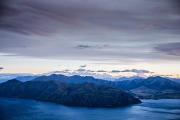 New Zealand landscape background. Roys peak mountain hike in Wanaka New Zealand. Popular tourism travel destination. Hiking travel and adventure. 