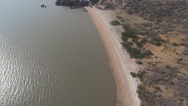 Tropical beach with ocean water and waves, aerial view. Top view aerial drone