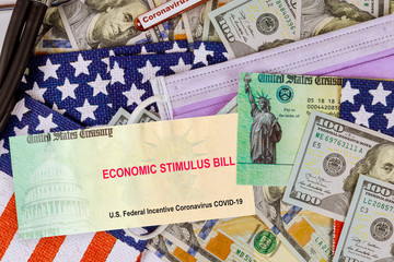 Stimulus bill USA dollar cash banknote on American flag Global pandemic Covid 19 lockdown