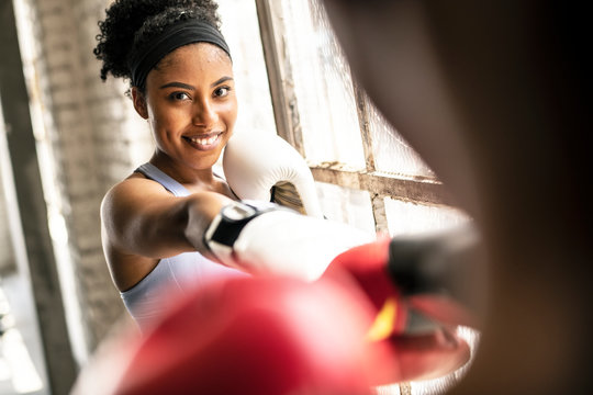 Strong and fit female boxer