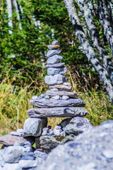 stone pyramids, little man, mound, ovoo, Inukshuk made near the lake or the mountain river