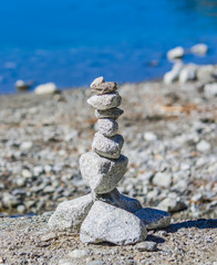 stone pyramids, little man, mound, ovoo, Inukshuk made near the lake or the mountain river