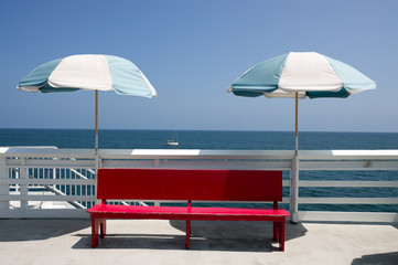 beach chairs and umbrella