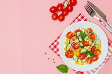Green salad with tomato and fresh vegetables